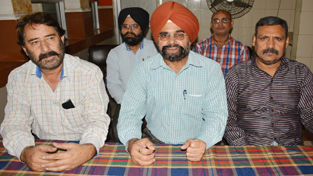 Leaders of JK Employees & Workers Federation at a press conference at Jammu on Thursday. — Excelsior/Rakesh