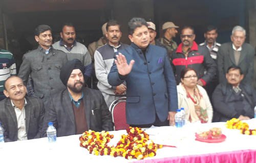 MLA Rajesh Gupta addressing a gathering at Chand Nagar in Jammu.
