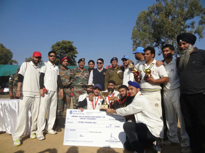 Poonch Royals team posing alongwith chief guest and other dignitaries after clinching the T20 title in Rajouri.