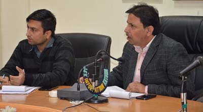 ADC Kathua Dr Bharat Bhushan expressing his views during a meeting.