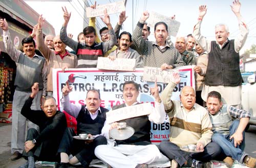 Sunil Dimple, president, Jammu West Assembly Movement and others raising slogans in support of their demands on Friday.