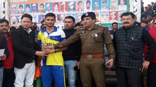 Winner receiving man of the match award at Sports Stadium in Kathua on Thursday.