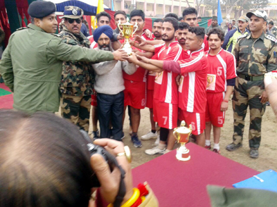 Winners posing alongwith chief guest and other dignitaries during concluding ceremony of Volleyball Tournament.
