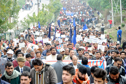 SC, ST, OBC members taking out protest rally in Jammu on Saturday. -Excelsior/Rakesh