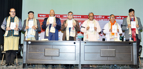 Panun Kashmir delegates releasing fact-sheet while observing Holocaust Day at Abhinav Theatre in Jammu on Thursday.