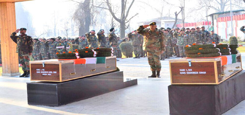 Army pays tribute to the soldiers who lost their lives fighting militants at South Kashmir’s Frisal hamlet in Kulgam on Monday. -Excelsior/Shakeel