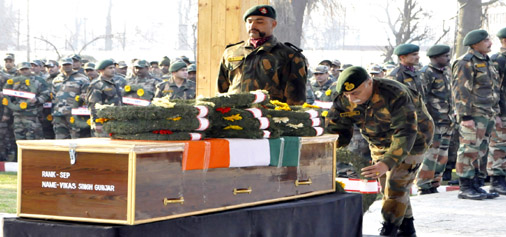 Army pays tributes to three soldiers, who were killed in a militant ambush at Shopian. -Excelsior/ Rakesh