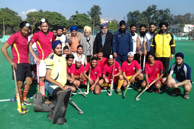 Winners posing for a group photograph at KK Hakhu Astroturf Hockey Stadium in Jammu.