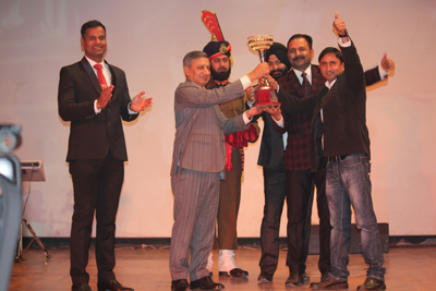 Winners trophy being presented by DGP Dr SP Vaid during closing ceremony of Udhampur Olympics on Wednesday.