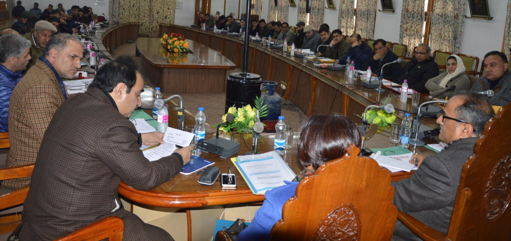 Deputy Chief Minister Dr Nirmal Singh chairing a meeting at Srinagar on Thursday.