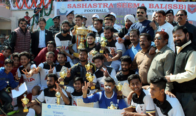 Winners of Football Tournament organised by SSB posing for a group photograph in Jammu on Thursday. -Excelsior/Rakesh
