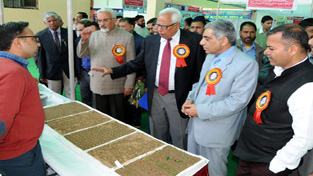 Governor N N Vohra and Minister for Agriculture Ghulam Nabi Lone inspecting a stall at Kisan Mela on Friday.