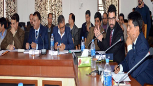 Chief Electoral Officer Shantmanu chairing a meeting in Anantnag on Sunday.