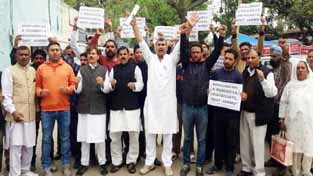 NPP activists staging protest against Govt in Jammu on Thursday.