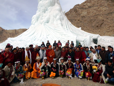 Dignitaries and others standing in front of artificial Ice-Stupa at Leh. —Excelsior/Morup Stanzin