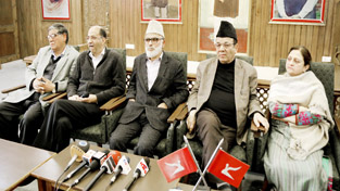 NC leaders addressing a press conference in Srinagar. -Excelsior/ Shakeel