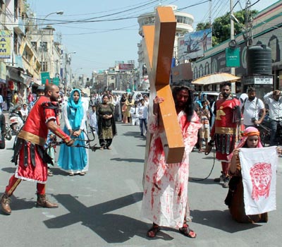 Members of Christian community taking out procession on the occasion of Good Friday in Jammu. -Excelsior/Rakesh