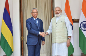 Prime Minister Narendra Modi meeting Prime Minister of the Republic of Mauritius Pravind Kumar Jugnauth, at Hyderabad House, in New Delhi on Saturday. (UNI)