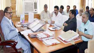 Deputation of Industries Assocation Kathua during a meeting with Deputy Chief Minister Dr Nirmal Singh at Srinagar on Tuesday.