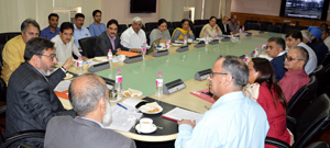 Minister for Education, Altaf Bukhari chairing a meeting in Srinagar on Friday.