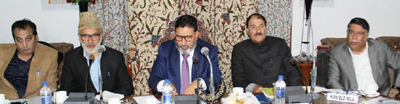 Minister for Education, Altaf Bukhari chairing a meeting in Srinagar on Saturday.