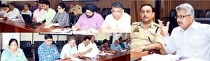 Divisional Commissioner MK Bhandari chairing a meeting in Jammu on Friday.