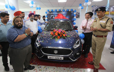 IGP Jammu Zone Dr SD Singh Jamwal and officials of Peaks Auto during launch of all New Dzire at Nanak Nagar, Jammu on Wednesday. —Excelsior/Rakesh