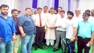 MP Jugal Kishore Sharma along with builders and SBI staff at Home Loan Mela at Gandhi Nagar in Jammu on Saturday.