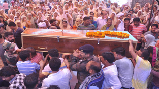 Thousands join funeral procession of martyr Ranjit Singh at Burn near Bhalwal in Jammu on Friday. — Excelsior/Rakesh