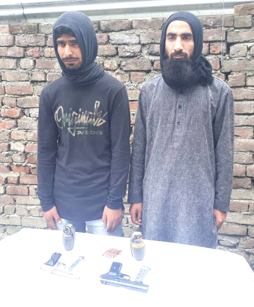 Two militants arrested by police in Handwara on Monday.