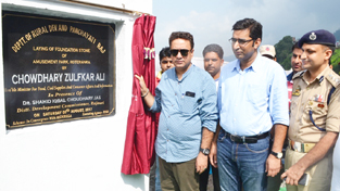 Minister for FCS &CA, Zulfkar Ali laying foundation stone of amusement park at Kotranka in Rajouri on Saturday.