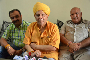 BJP MLCs Ashok Khajuria and Vikram Randhawa at a press conference at Jammu on Friday. — Excelsior/Rakesh