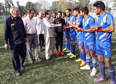 Commissioner Secretary Youth Services and Sports, Hilal Ahmad Parray interacting with footballers in Srinagar on Sunday.
