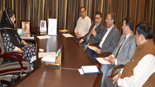 Chief Minister Mehbooba Mufti interacting with Secretary Ministry of HRD at Srinagar on Wednesday.