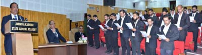Oath being administered to newly enrolled advocates at Srinagar on Tuesday.