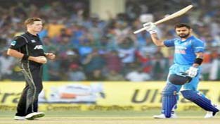 Virat Kohli celebrates his century during 3rd ODI cricket match against New Zealand at Green Park Stadium in Kanpur on Sunday.