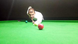 Cueist Umer Himanyun aiming at target during Six Red Balls Championship in Jammu.