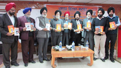 Writers, poets and other dignitaries during a book release function at KL Saigal Hall, Jammu.