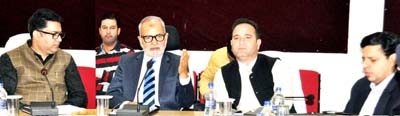 Works Minister Naeem Akhtar chairing a meeting at Jammu on Tuesday.