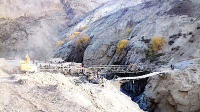 A portable steel bridge launched over Zanskar river by BRO. -Excelsior/Morup Stanzin