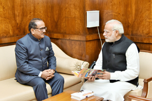 DyCM Dr Nirmal Singh meeting Prime Minister Narendra Modi in New Delhi on Thursday.