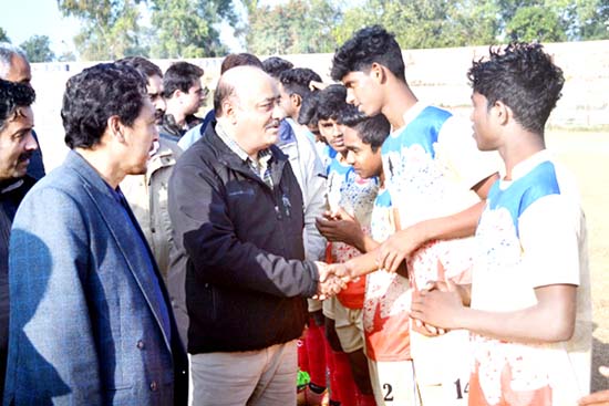 Director Sports, Sheikh Fayaz Ahmed interacting with young footballers during 63rd National School Games at MA Stadium in Jammu.