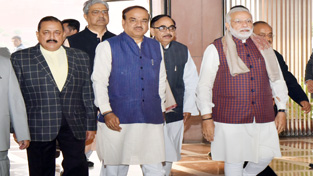 Prime Minister Narendra Modi arriving at Parliament House to attend the BJP Parliamentary Party meeting on Wednesday. Also seen are Union Ministers Ananth Kumar and Dr Jitendra Singh.