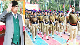 Governor N N Vohra taking salute of the marching contingents at 55th Raising Day of HG&CD at Jammu on Wednesday.