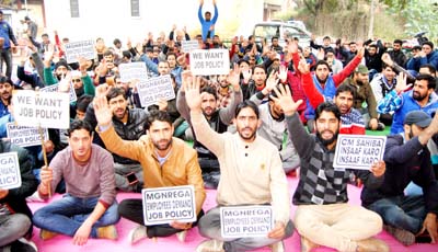 MGNREGA workers staging protest in Jammu on Sunday.