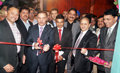 Chairman J&K Bank Parvez Ahmed along with other officials inaugurating Business Unit.
