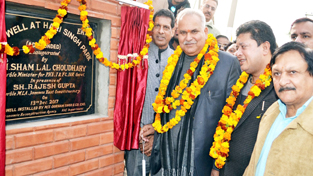 PHE Minister, Sham Lal Choudhary along with MLA Rajesh Gupta inaugurating tube well at Maharaja Hari Singh Park, Jammu.