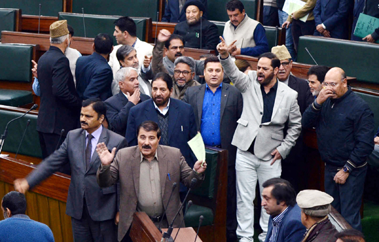 Opposition MLAs protesting in the Assembly on Saturday. -Excelsior/Rakesh