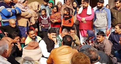 MP Jugal Kishore Sharma and MLA Marh, Sukhnandan Kumar interacting with border firing victims in Kanachak on Wednesday.