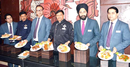 Chefs showing cuisines to be served to the people during food festival “Kebabs for Nawabs”. -Excelsior/Rakesh